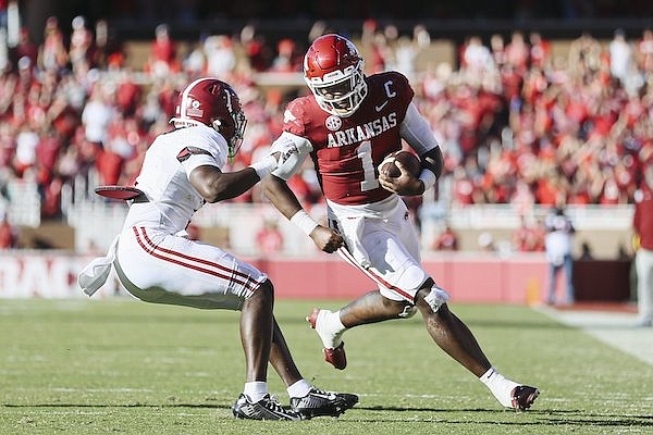 Arkansas quarterback KJ Jefferson (1) carries the ball during a game against Alabama on Saturday, Oct. 1, 2022, in Fayetteville.