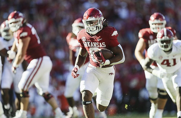 Arkansas' AJ Green (0) runs for a touchdown during a game against Alabama on Saturday, Oct. 1, 2022, in Fayetteville.
