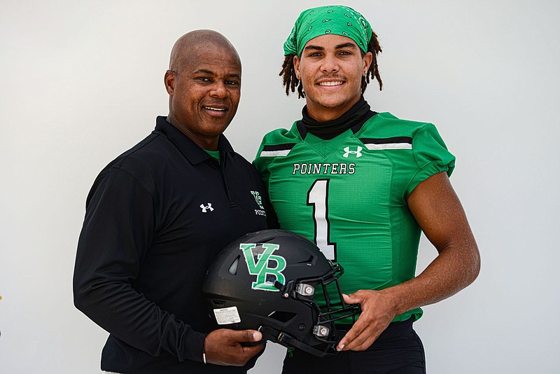 Malachi Henry of Van Buren, seen here with Van Buren head coach Moe Henry, has been selected to The List for 2022..(NWA Democrat-Gazette/Hank Layton)