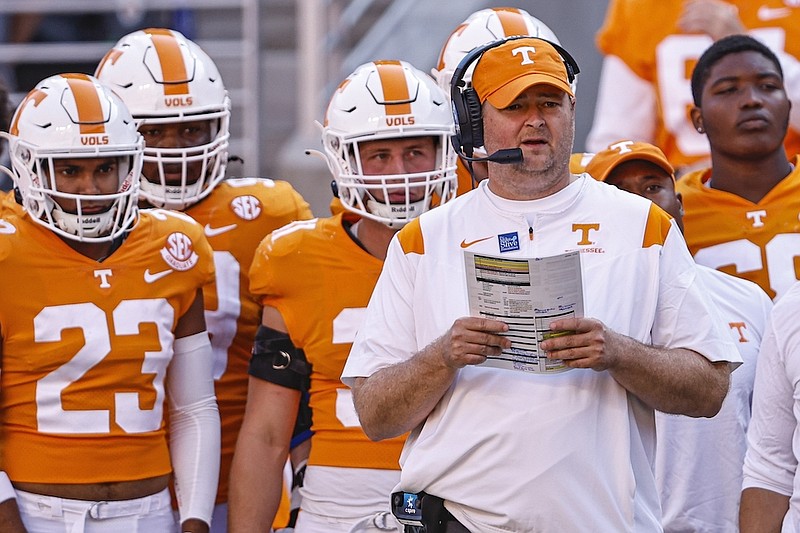 Tennessee head coach Josh Heupel watches his team during the first half of an NCAA college football game against Florida, Saturday, Sept. 24, 2022, in Knoxville, Tenn. (AP Photo/Wade Payne)