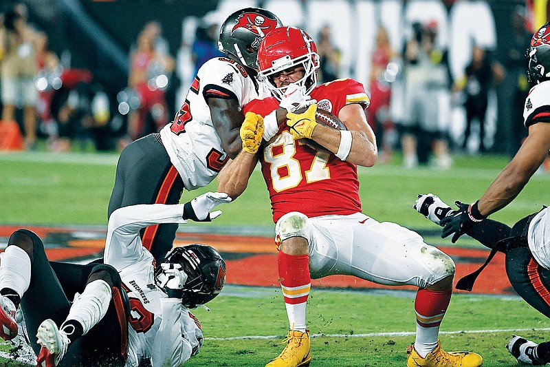 Chiefs tight end Travis Kelce makes a catch during Sunday night’s game against the Buccaneers in Tampa, Fla. (Associated Press)