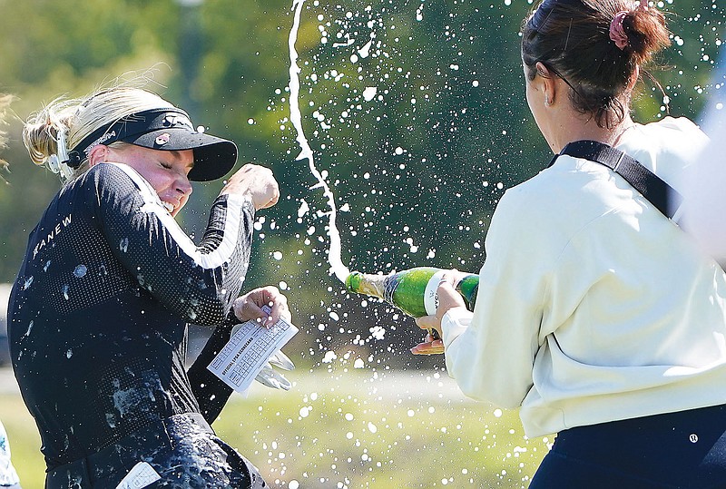 Charley Hull is doused Sunday after winning the LPGA The Ascendant in The Colony, Texas. (Associated Press)