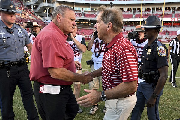 Arkansas coach Sam Pittman, left, shakes hands with Alabama coach Nick Saban after an NCAA college football game Saturday, Oct. 1, 2022, in Fayetteville. (AP Photo/Michael Woods) Arkansas coach Sam Pittman, left, shakes hands with Alabama coach Nick Saban after an NCAA college football game Saturday, Oct. 1, 2022, in Fayetteville. (AP Photo/Michael Woods)