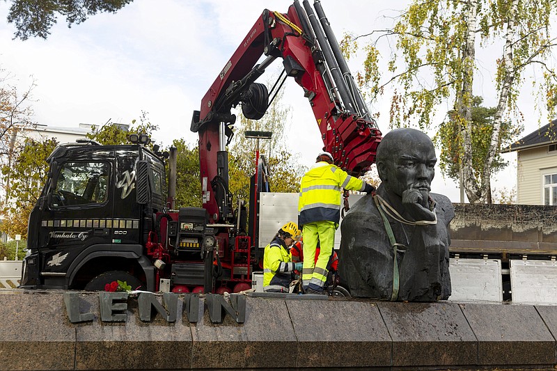 A statue of Vladimir Lenin is removed from the streets of the city of Kotka, Finland Tuesday, Oct. 4, 2022. The southeastern Finnish city of Kotka on Tuesday removed the last publicly displayed statue of Russian bolshevik leader Vladimir Lenin in the Nordic country due to increasing pressure from residents in the wake of Russia’s war in Ukraine. (Sasu Makinen/Lehtikuva via AP)