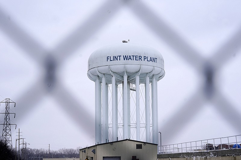 The Flint water plant tower is seen on Jan. 6, 2022, in Flint, Mich. (AP Photo/Carlos Osorio, File)