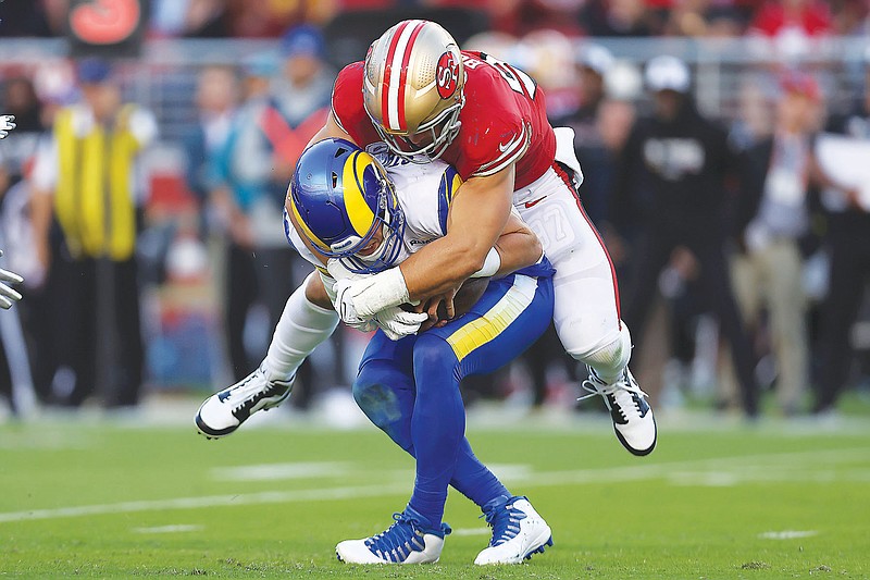 Niners defensive end Nick Bosa sacks Rams quarterback Matthew Stafford during the first half of Monday night's game in Santa Clara, Calif. (Associated Press)