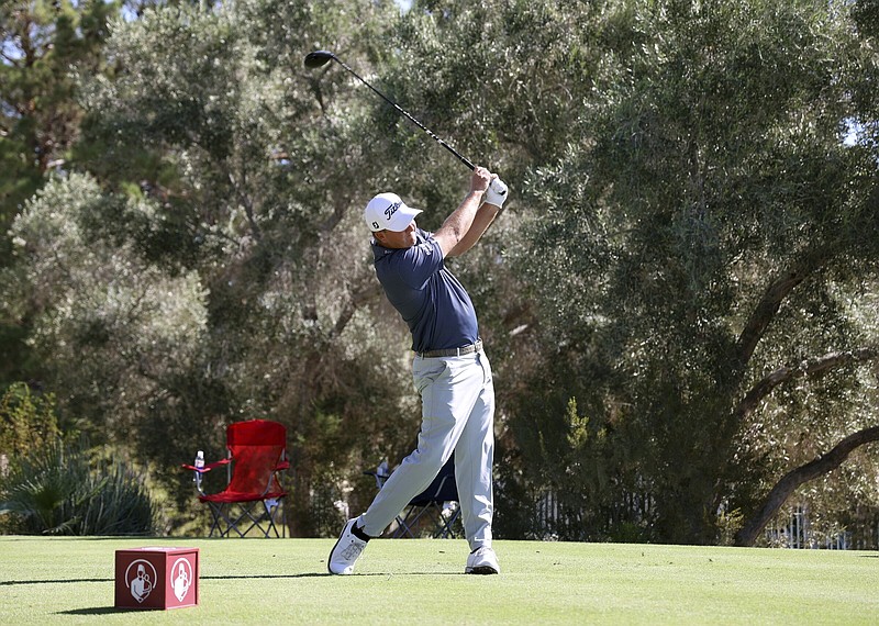 Tom Hoge opened with a pair of eagles for a 63 in Las Vegas at the Shriners Children’s Open and has a one-shot lead over Si Woo Kim and Maverick McNealy. Kim had a 65 and Homa had a 67. Patrick Cantlay also shot a 67.  
(AP/Ronda Churchill)