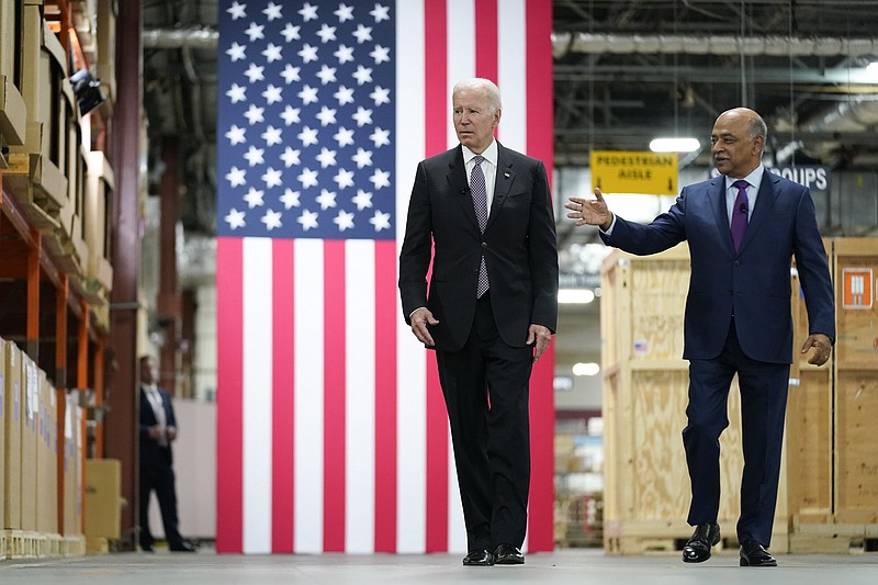 President Joe Biden listens Thursday as IBM Chairman and Chief Executive Officer Arvind Krishna speaks during a tour of an IBM facility in Poughkeepsie, N.Y.
(AP/Andrew Harnik)