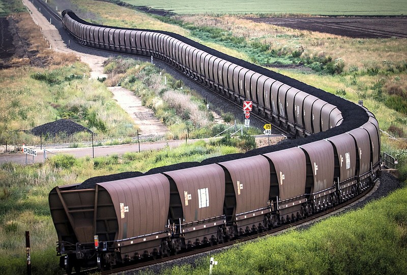 A freight train transports coal from the Gunnedah Coal Handling and Prepararation Plant, operated by Whitehaven Coal Ltd., in Gunnedah, New South Wales, Australia in this file photo.
(Bloomberg News WPNS/David Gray)