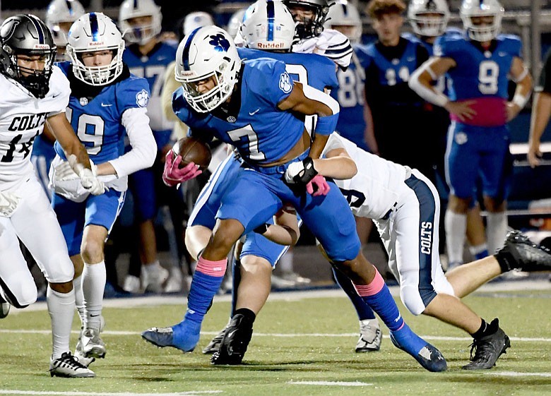 Staff Photo by Robin Rudd / Ringgold's Peyton Williams (7) gets some yardage up the middle.  The Ringgold Tigers hosted in the Coahulla Creek Colts in a Region 6 AAA, GHSA, football game on October 7, 2022.