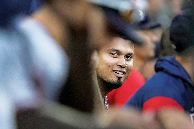 Luis Arraez of the Twins smiles on the bench during the eighth inning of Wednesday’s game against the White Sox in Chicago. (Associated Press)