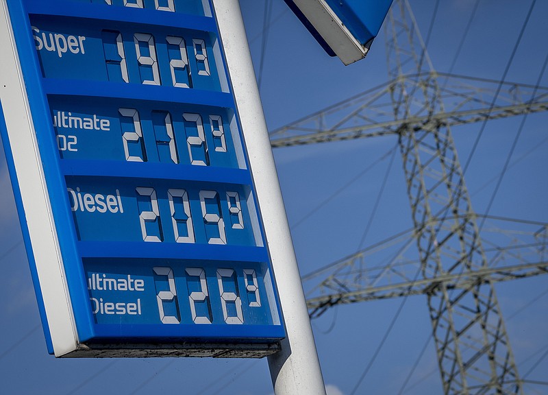 Gas prices are displayed at a gas station in Frankfurt, Germany, Wednesday, Oct. 5, 2022. A cut in oil production is on the table when OPEC oil-producing countries meet Wednesday. The OPEC+ alliance that includes Saudi Arabia and Russia is weighing a cut of a million barrels per day or more. The idea is to boost oil prices that have fallen from summer highs of over $100 to around $80 for U.S. crude.  (AP Photo/Michael Probst)