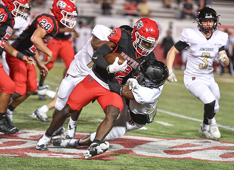 PREP FOOTBALL Grizzlies quarterback Savoy comes back to help Northside