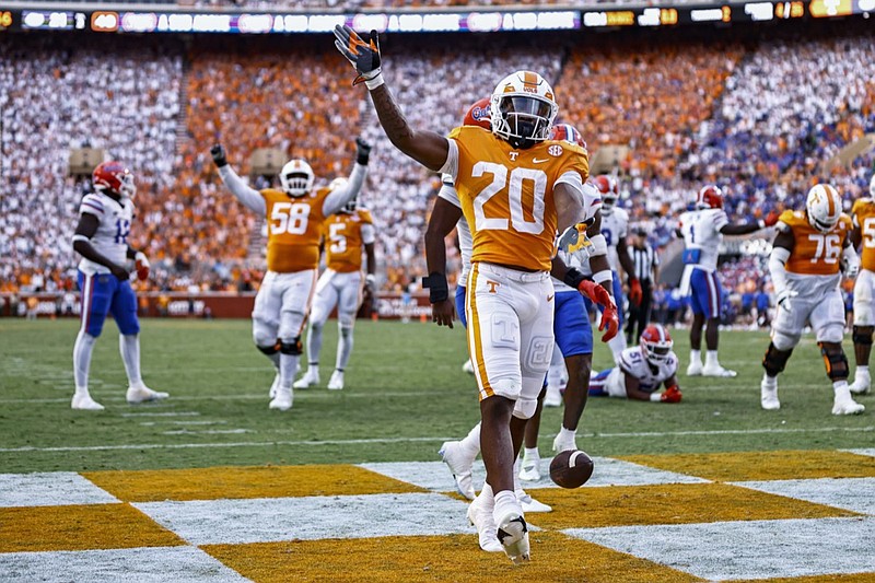 Tennessee running back Jaylen Wright (20) celebrates a touchdown during the second half of the team's NCAA college football game against Florida on Saturday, Sept. 24, 2022, in Knoxville, Tenn. Tennessee won 38-33. (AP Photo/Wade Payne)