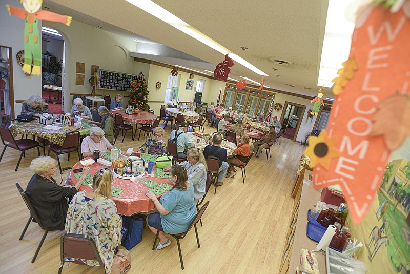 Visitors play bingo, Friday, Oct. 7, 2022, at the Betty Wilkinson Senior Activity Center in Greenwood. The Greenwood City Council on Monday approved an offer to purchase about two acres at 1917 Excelsior Road outside the city for $825,000. The property will be used as the site for a new senior center. Visit nwaonline.com/221009Daily/ for today's photo gallery..(NWA Democrat-Gazette/Hank Layton)