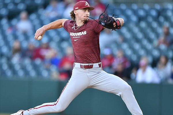 Arkansas pitcher Jaxon Wiggins throws during a scrimmage against the Texas Rangers instructional league team on Wednesday, Oct. 12, 2022, in Fayetteville.
