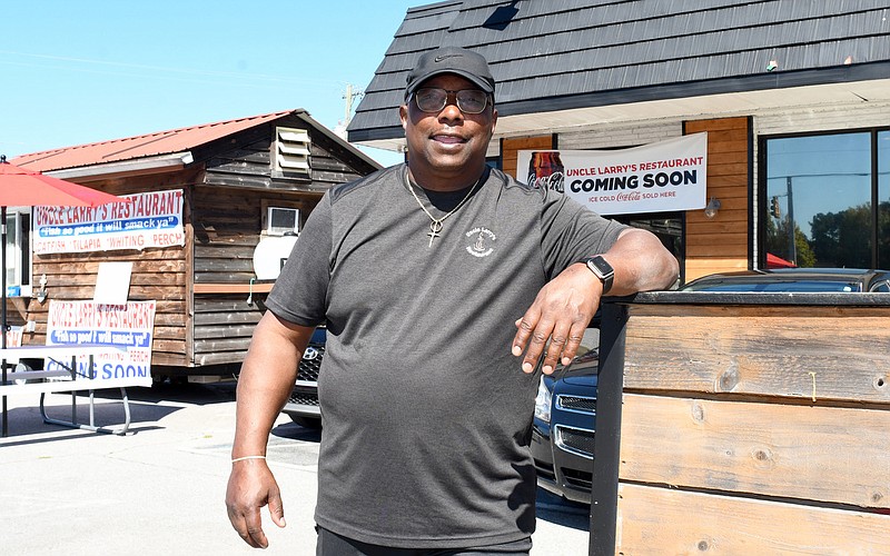 Staff Photo by Robin Rudd / Larry Torrence poses outside his new location.  Larry Torrence will be opening his fourth Uncle Larry's restaurant at 8701 East Brainerd Road.  Uncle Larry's was photographed on October 6, 2022.