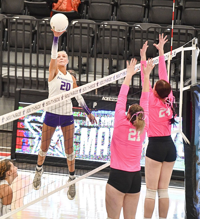 Brooke Rockwell (20) of Fayetteville spikes the ball in the Bulldogs’ straight-set victory over Fort Smith Southside on Thursday in Fort Smith. Rockwell had a game-high 17 kills.
(NWA Democrat-Gazette/Hank Layton)