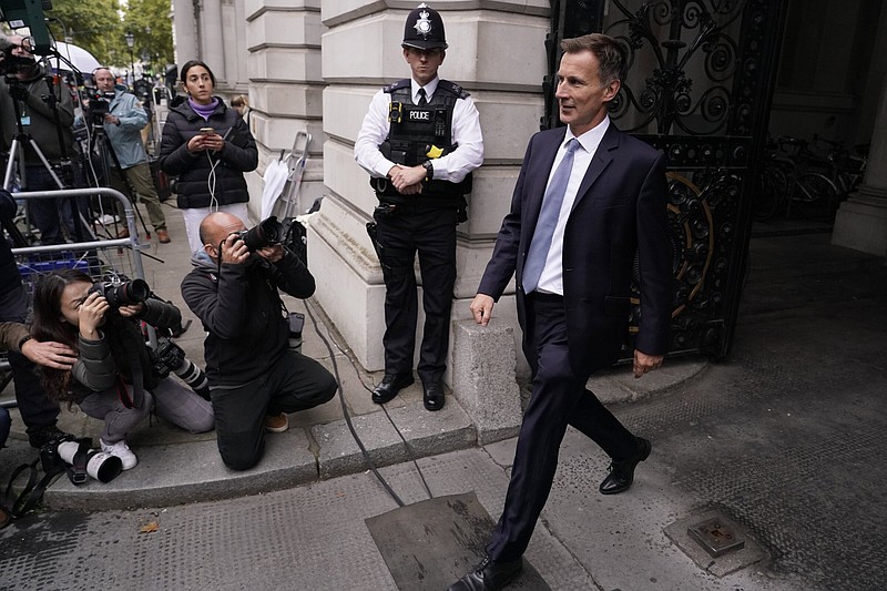 Britain’s new Treasury Chief Jeremy Hunt arrives Friday at 10 Downing Street to see the Prime Minister Liz Truss in London. Truss fired her former Treasury chief Kwasi Kwarteng and reversed course on tax cuts Friday as she tries to hang on to her job after weeks of turmoil on financial markets.
(AP/Alberto Pezalli)