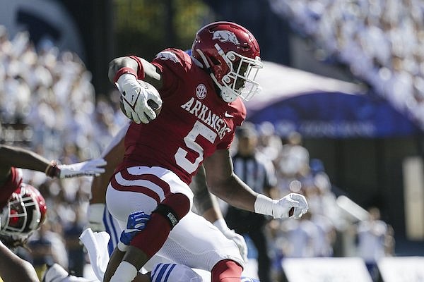Arkansas running back Raheim Sanders (5) carries the ball during a game against BYU on Saturday, Oct. 15, 2022, in Provo, Utah.
