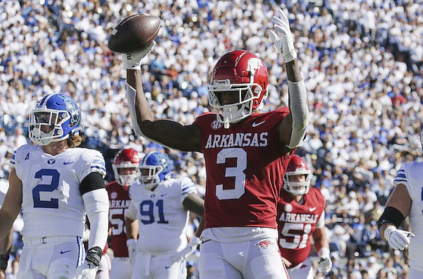 Arkansas wide receiver Matt Landers (3) scores on Saturday, Oct. 15, 2022, during the second quarter of a football game at LaVell Edwards Stadium in Provo, Utah.