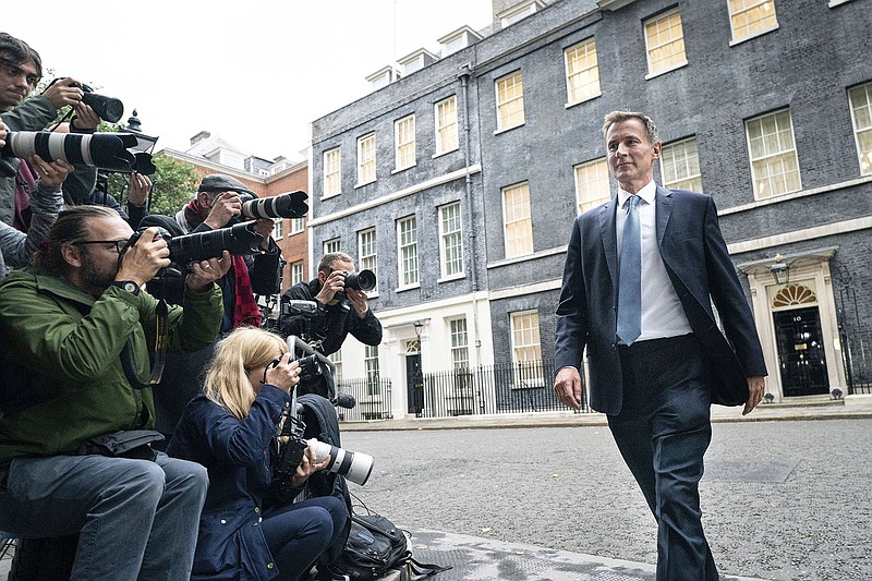 Jeremy Hunt leaves 10 Downing Street on Friday after he was appointed Chancellor of the Exchequer, replacing Kwasi Kwarteng, who said he accepted Prime Minister Liz Truss’ request that he “stand aside” in the wake of the chaos unleashed by his mini-budget. 
(AP/PA/Stefan Rousseau)