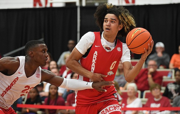 Anthony Black (right) looks to pass while Derrian Ford defends during Arkansas' Red-White Game on Sunday, Oct. 16, 2022, at Barnhill Arena in Fayetteville. Anthony Black (right) looks to pass while Derrian Ford defends during Arkansas' Red-White Game on Sunday, Oct. 16, 2022, at Barnhill Arena in Fayetteville.