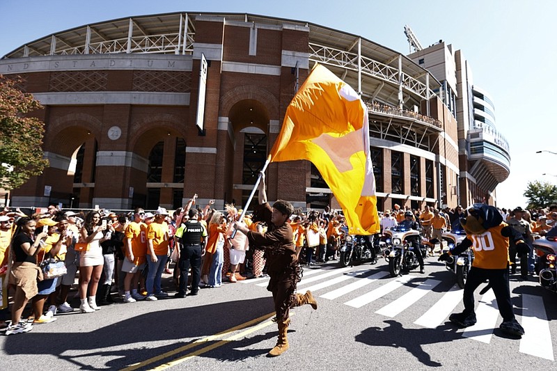 Tennessee mascots celebrate during the Vol Walk before an NCAA college football game against Alabama Saturday, Oct. 15, 2022, in Knoxville, Tenn. (AP Photo/Wade Payne)