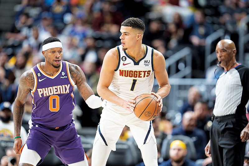 Michael Porter Jr. of the Nuggets is defended by Torrey Craig of the Nuggets during a preseason game last week in Denver. Porter is entering his fourth season out of Missouri. (Associated Press)