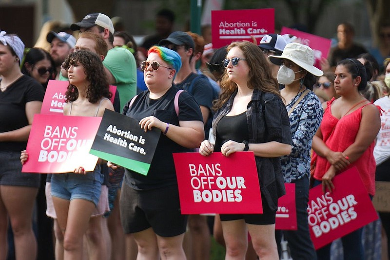 Staff photo by Olivia Ross / Many gathered in Coolidge Park on June 24, 2022, to protest the Dobbs v. JWHO decision to overturn Roe v. Wade. The Chattanooga Health Advocacy Team, who organized the rally, had several speakers and resource information available nearby.