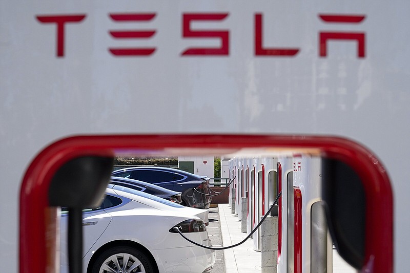 Tesla reports 3Q profit increase