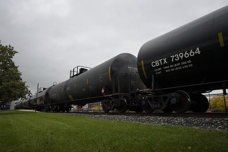 A freight train rolls through a station in Northbrook, Ill., on Oct. 12. The major railroads on Wednesday rejected a maintenance workers union request to add paid sick time to the 24% raises and $5,000 in bonuses initially received in negotiating a new five-year contract.
(AP/Nam Y. Huh)