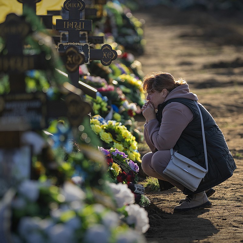 Tamara, 50, mourns Wednesday at a cemetery in Mykolaiv, Ukraine, at the grave of her only son, a soldier who was killed during a Russian bombing raid. Tamara said she did not learn of her son’s death for four months, when she managed to escape from her Russian-occupied village in the Kherson region.
(AP/Emilio Morenatti)