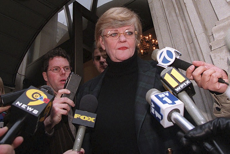 FILE - New York literary agent Lucianne Goldberg addresses a large assembly of media outside her apartment Saturday, Jan. 24, 1998, in New York. Goldberg, a key figure in the 1998 impeachment of President Bill Clinton over his affair with Monica Lewinsky, has died, Wednesday, Oct. 26, 2022 at the age of 87. (AP Photo/Emile Wamsteker, File)