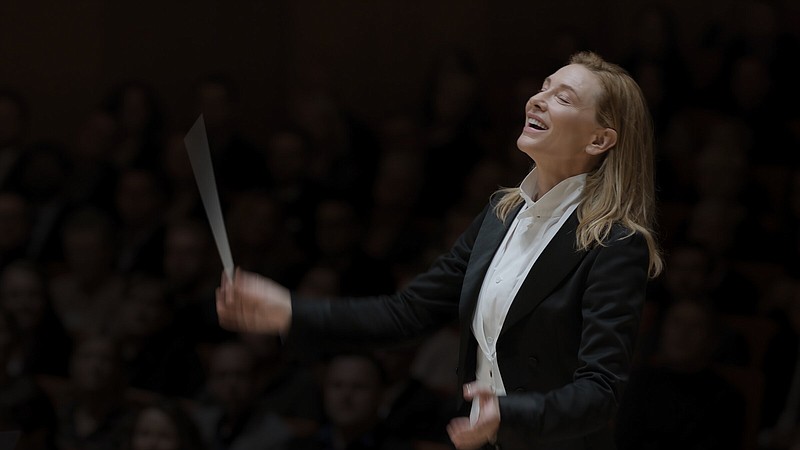 Imperious maestro Lydia Tár (Cate Blanchett) leads the Berlin Philharmonic through Mahler’s Symphony No. 5 in Todd Field’s examination of power and how it corrupts “Tár.”