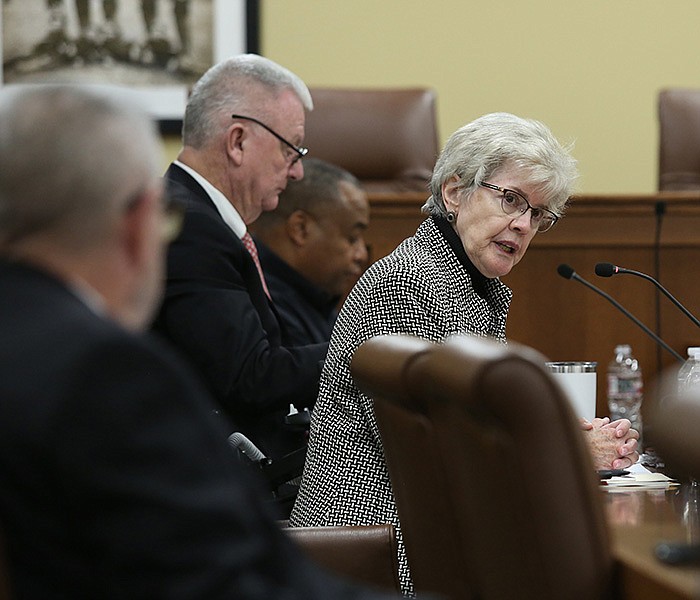 Annabelle Imber Tuck, chairwoman of the Arkansas Independent Citizens Commission, presides over a meeting of the group at the state Capitol on Friday.
(Arkansas Democrat-Gazette/Colin Murphey)
