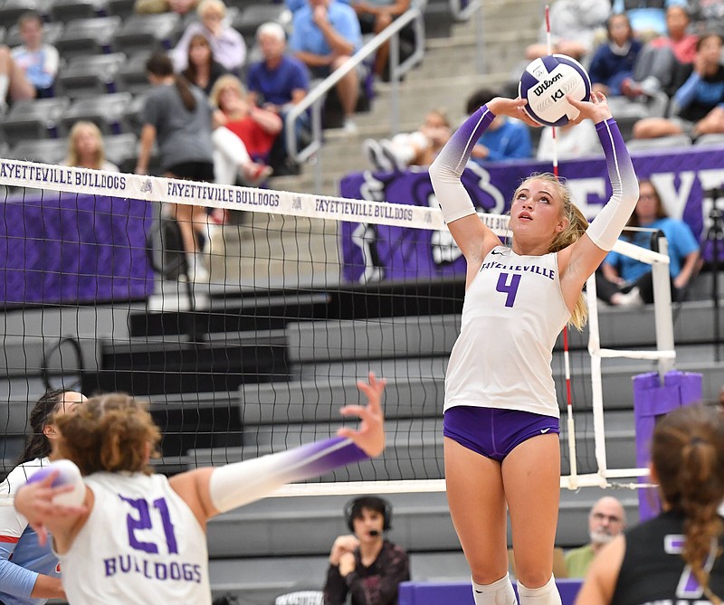 Fayetteville's Kennedy Phelan sets the ball Wednesday, Sept. 14, 2022, during the first set against Fort Smith Southside in Bulldog Arena in Fayetteville. Visit nwaonline.com/220915Daily/ for today's photo gallery. .(NWA Democrat-Gazette/Andy Shupe)