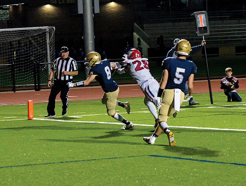 Alex Marberry of helias scores a touchdown during the first half of Friday night’s game against Liberty: Wentzville at Ray Hentges Stadium. (Ken Barnes/News Tribune)