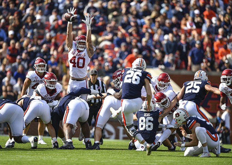 Arkansas defensive lineman Landon Jackson (40) attempts to block a field goal by Auburn kicker Anders Carlson (26), Saturday, Oct. 29, 2022, during the first quarter of the Razorbacks’ 41-27 win over the Tigers at Jordan-Hare Stadium in Auburn, Ala. Visit nwaonline.com/221030Daily/ for today's photo gallery..(NWA Democrat-Gazette/Hank Layton)