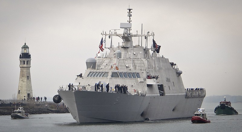 The new USS Little Rock arrives at Buffalo harbor with a police and fireboat escort, Monday, Dec. 4, 2017, in Buffalo, N.Y. The littoral combat ship will be docked on the Lake Erie waterfront until its commissioning Dec. 16, 2017. (AP Photo/Carolyn Thompson)