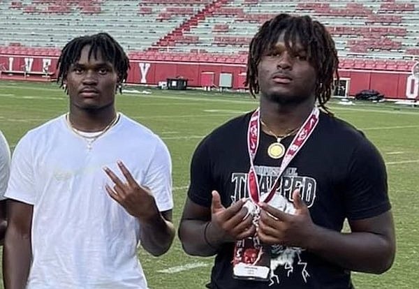 Arkansas CB Dallas Young (left) and 2024 DL commitment Kavion Henderson.