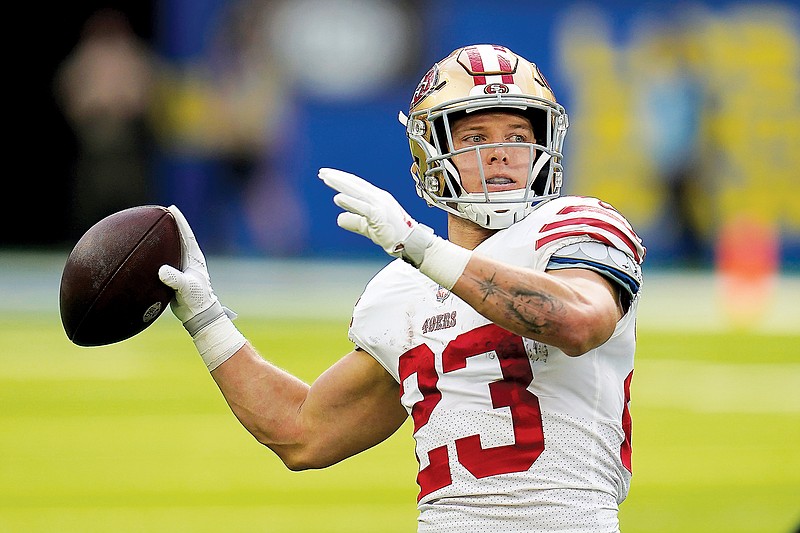 Christian McCaffrey and the 49ers win 13th straight in the regular