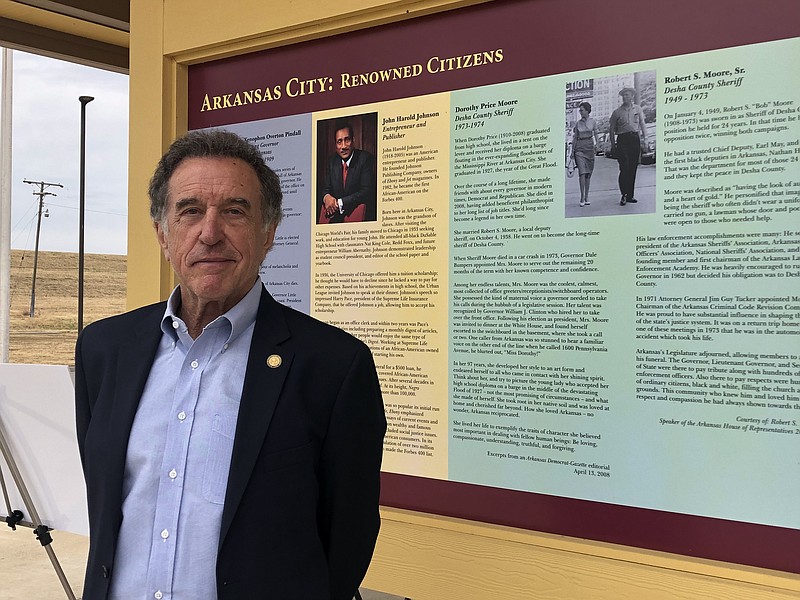 Arkansas Highway Commission Chairman Robert Moore Jr. stands before a marker about Arkansas City leaders during a groundbreaking Tuesday at the Arkansas Heritage Trail State Park for the John H. Johnson Park. Johnson, who was the founder of company that published influential Black magazines Ebony and Jet, is featured in the marker, as is his parents, Dorothy Price Moore and Robert Moore Sr., who both served as Desha County Sheriff..(Arkansas Democrat-Gazette/Daniel McFadin).