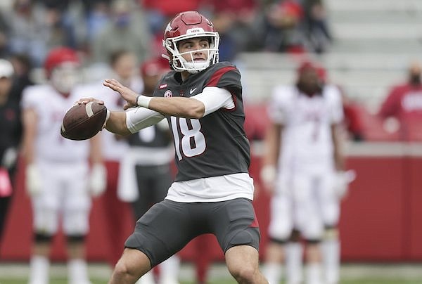 Arkansas quarterback Kade Renfro throws a pass during a scrimmage Saturday, April 17, 2021, in Fayetteville.