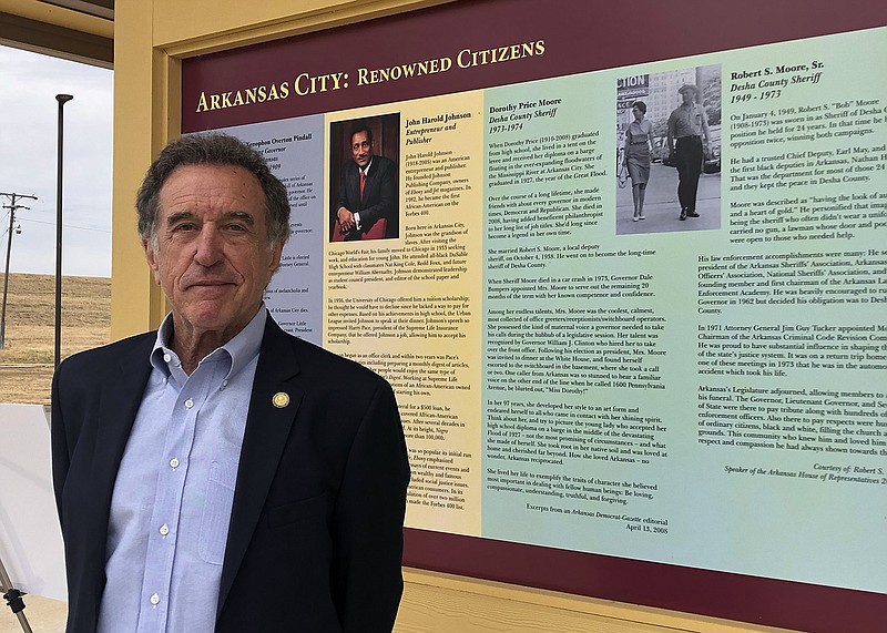 Arkansas Highway Commission Chairman Robert Moore Jr. stands before a marker about Arkansas City leaders during a groundbreaking Tuesday at the Arkansas Heritage Trail State Park for the John H. Johnson Park. Johnson, who was the founder of company that published influential Black magazines Ebony and Jet, is featured in the marker, as is his parents, Dorothy Price Moore and Robert Moore Sr., who both served as Desha County Sheriff..(Arkansas Democrat-Gazette/Daniel McFadin).