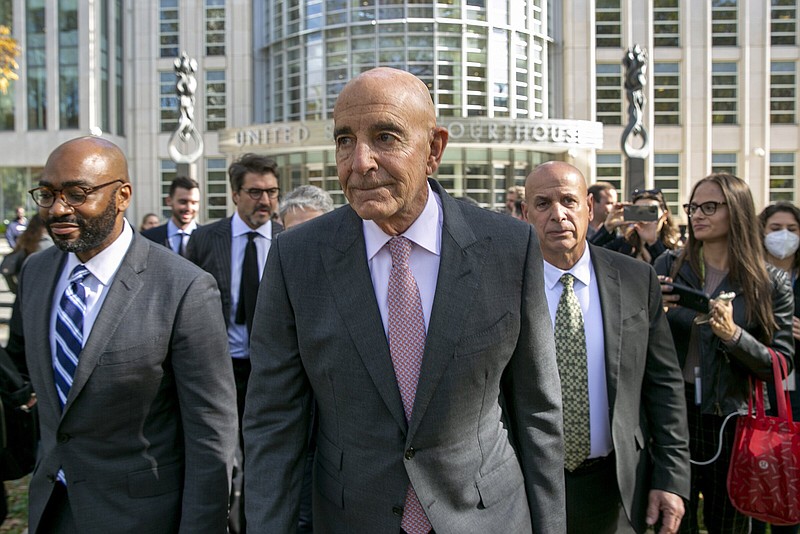 Tom Barrack (center) leaves Brooklyn Federal Court after his aquittal Friday.
(AP/Ted Shaffrey)