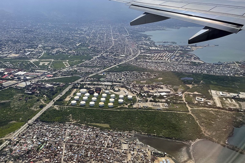 Haiti’s National Police have been fighting for almost two months to remove a powerful gang that surrounded this key fuel terminal, shown Friday, in the capital of Port-au-Prince.
(AP/Ramon Espinosa)