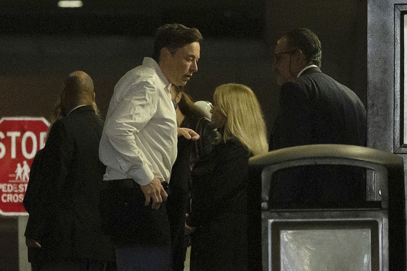 Elon Musk arrives at Baron Investment Conference at the Metropolitan Opera House, Friday, Nov. 4, 2022, in New York. Employees are bracing for widespread layoffs at Twitter as Musk overhauls the social platform. (AP Photo/Yuki Iwamura)