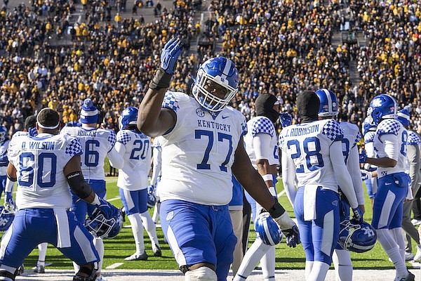 Kentucky offensive lineman Jeremy Flax (77) taunts the crowd in the final minute of the fourth quarter of an NCAA college football game against Missouri, Saturday, Nov. 5, 2022, in Columbia, Mo. Kentucky won 21-17. (AP Photo/L.G. Patterson)
