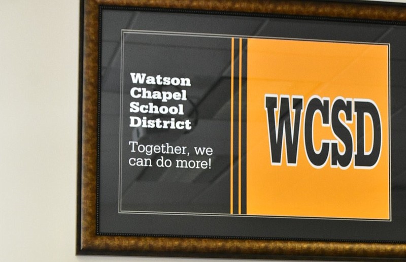 A sign touting the Watson Chapel School District is shown during a meeting of the School Board in this Aug. 8, 2022 file photo. (Pine Bluff Commercial/I.C. Murrell)